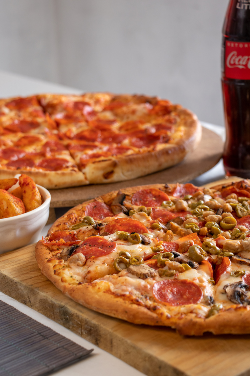 Close-Up Shot of Pizzas 